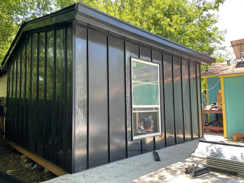 Black standing seam metal wall panels for Metal Roof Installation in Middle Smithfield